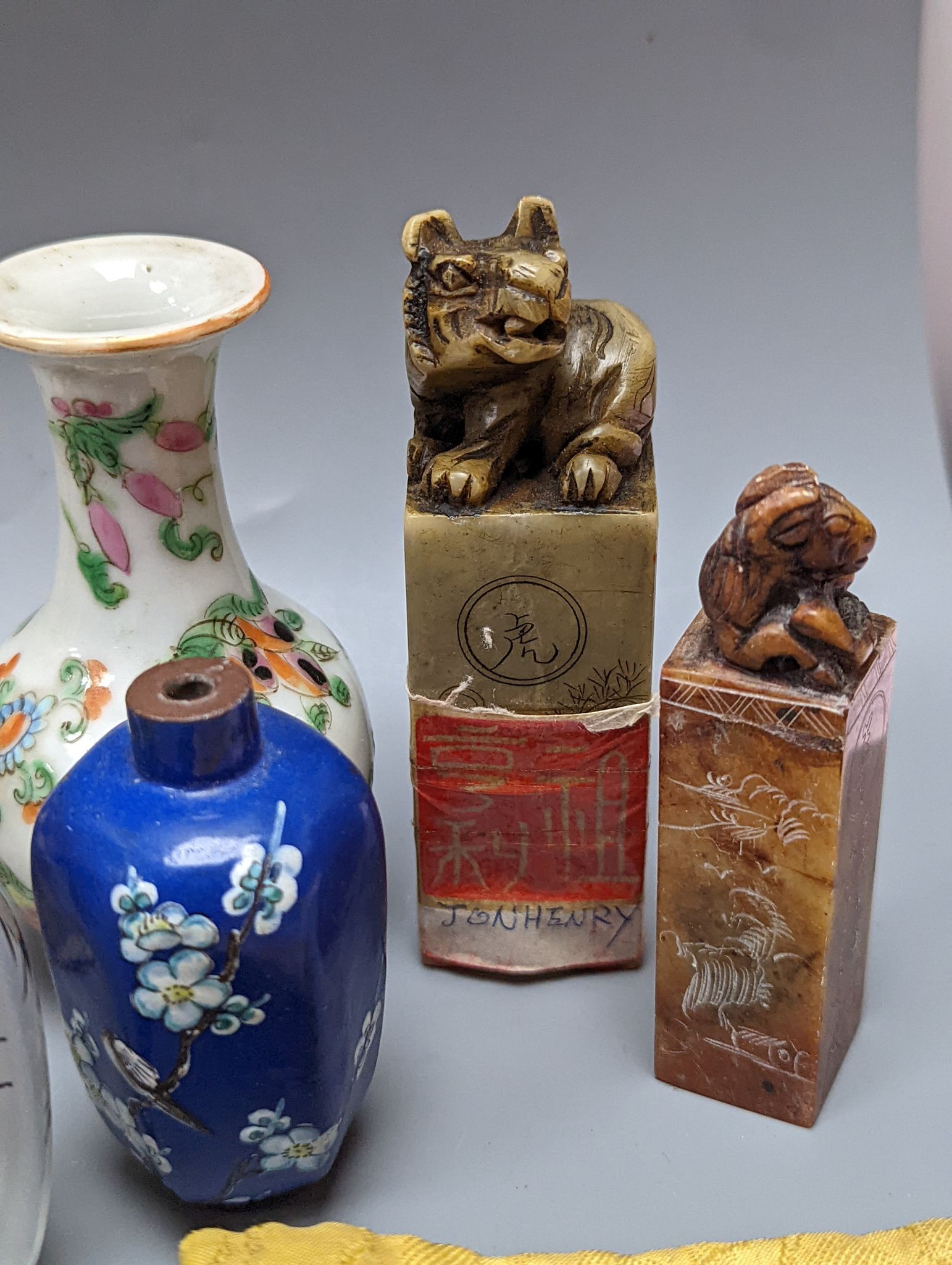 A group of Oriental ivory, inside-painted snuff bottle, soapstone carvings, etc. (14)